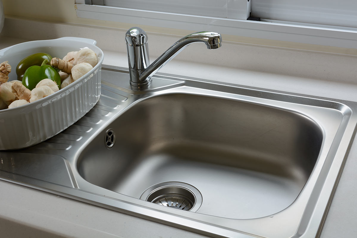 Why Does My Kitchen Sink Smell and How to Fix The Brisbane Plumbers
